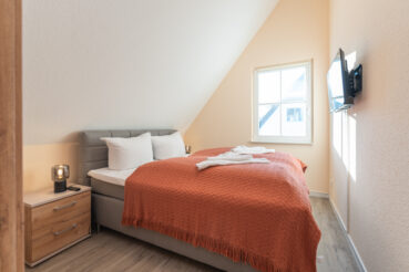 Schlafzimmer 2 im Obergeschoss | Ferienhaus Kieferneck im Fischerdorf Zirchow auf Usedom